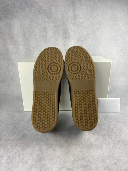 Maison Margiela paint replica sneaker